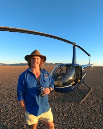 Nick Cummins with helicopter