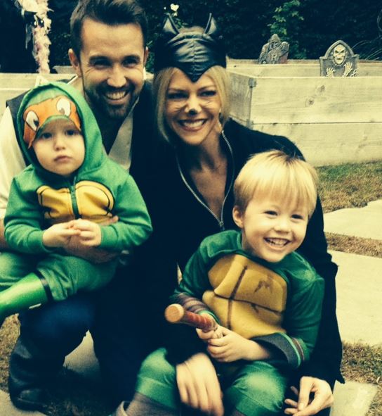 Kaitlin Olson with her husband and children