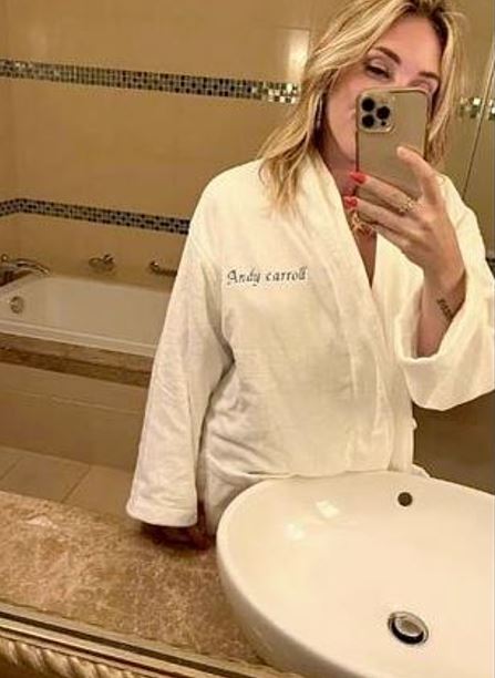 Taylor Jane Wilkey wearing Andy Carroll's personalized bathrobe