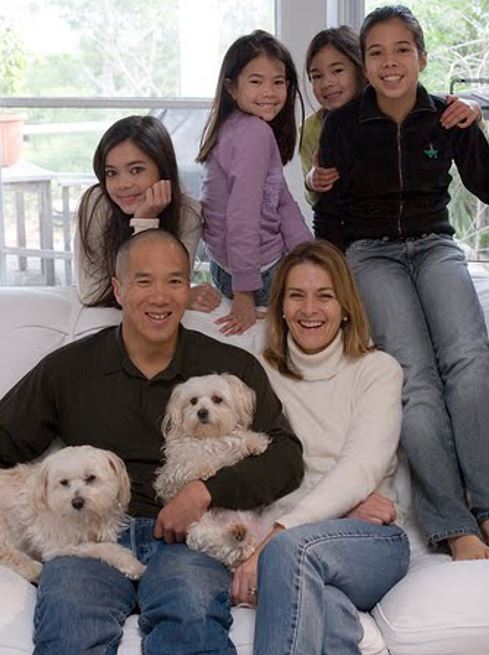 Charlie Teo with his wife Genevieve Teo and their four daughters