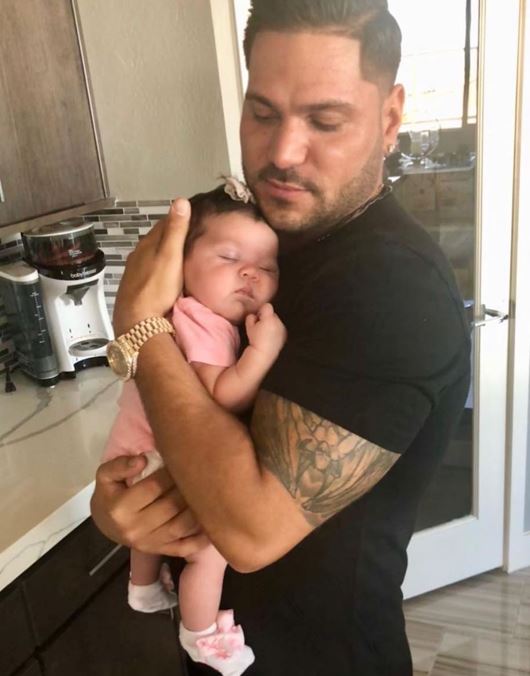 Ronnie Ortiz-Magro holding his daughter Ariana Sky Magro