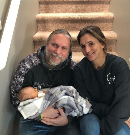 Lori Barczyk and Brian Barczyk with their baby