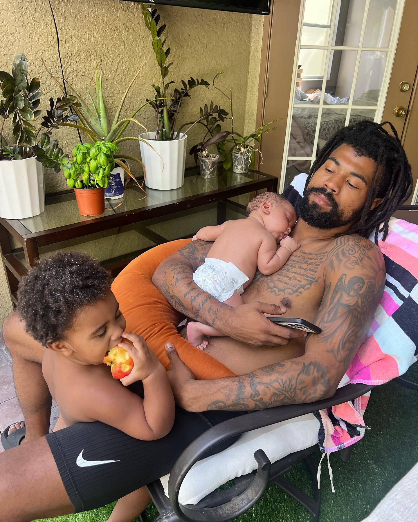 Cam Sutton with his babies