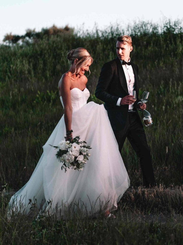 lauren tomasi reporter with her husband